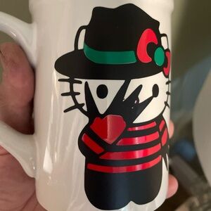 Hello Kitty Freddy Kruger Mug 
with Red and Black Design